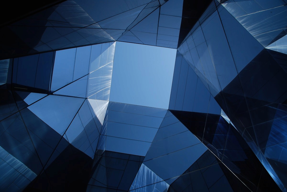 Low angle photo of a curtain wall building